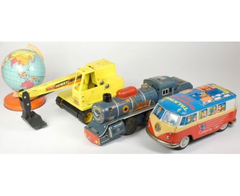 A talking camping car, in the form of a VW campervan, made in Japan, together with a tinplate train, Golden Arrow, 30cm, a Tr