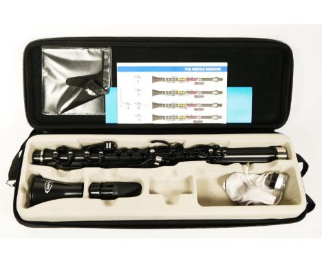 A Nuvo Clarineo, with fingering chart and manual, in a carry case with fitted interior 
