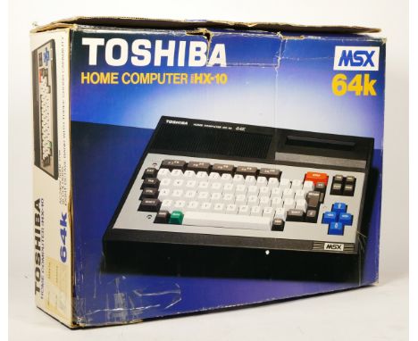 A Toshiba MSX HX-10 64k home computer (serial No. 213989), AV cables, MSX BASIC reference manual and owner’s manual, original
