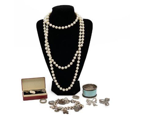 Assorted costume jewellery including a&nbsp; brooch, silver charm bracelet with charms, 9ct gold ring and a mourning brooch w