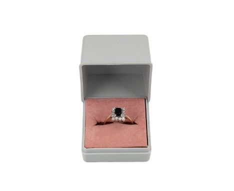9ct gold faux diamond and sapphire rectangular shaped ring weight 2.1, size N.