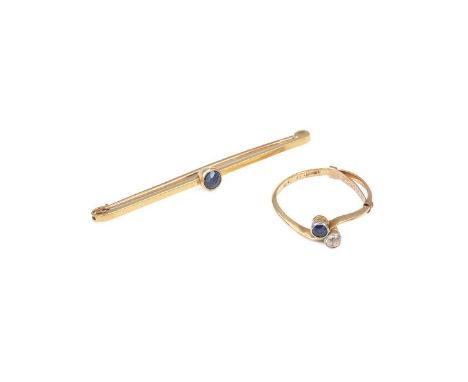 18ct jem set ring set in a twisted setting hallmarked 18ct weight 1.7 grams size O and 18ct bar brooch set with a sapphire ha