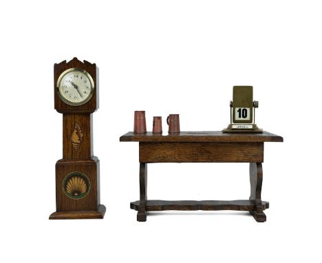 Apprentice pieces: an oak refectory table, the lid lifting to reveal a music box and storage compartment; and a miniature oak