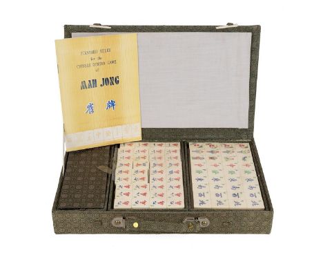 Vintage mahjong set in original case, still&nbsp;sealed, unused, with rules in English. 32cm x 19.5cm the case.