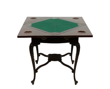 Edwardian mahogany envelope card table with carved single drawer with brass rococo style drawer pulls. Raised on tapering car