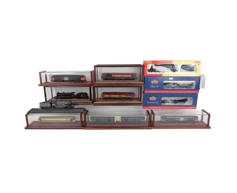 Collection of Model 00 gauge trains, boxed and in glass Cabinets. Includes boxed Bachmann Class A1 loco and tender 60157; box