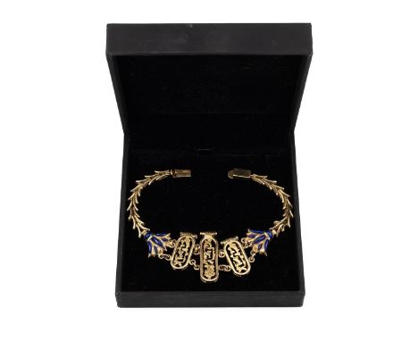 14ct gold&nbsp;Egyptian bracelet hallmarked and tested, with three pierced panels flanked by two enamel shoulders with V link