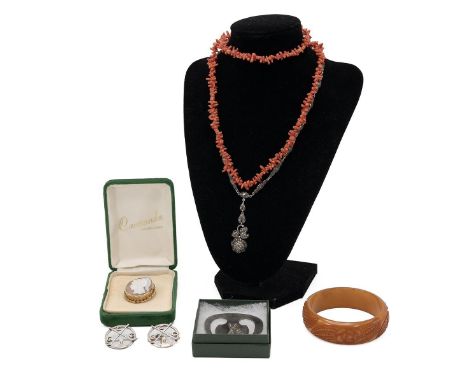 9ct gold cameo brooch, two G C C golf brooches dated 1974 &amp; 1978 a golf EPNS page marker, amber style bangle, coral neckl