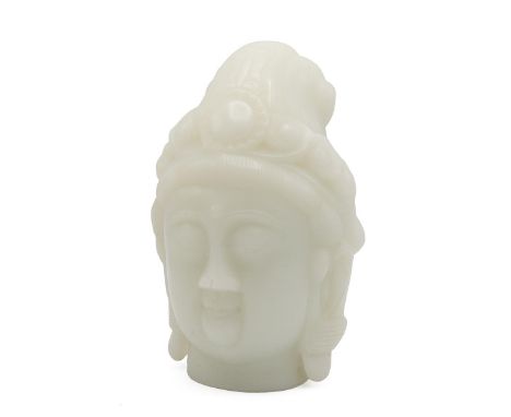 A large jade carved Buddha's head, 20th century - height 23cm.