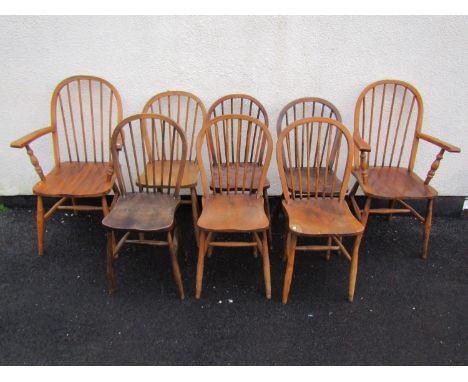 A set of eight (6+2) Windsor stained elm and beechwood hoop and stick back dining chairs 