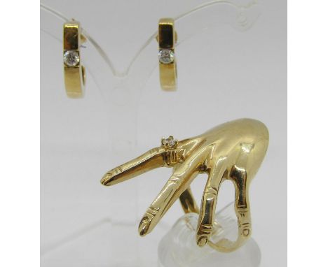 Unusual novelty 9ct ring in the form of a hand, maker 'AG', Sheffield 1999, size Q and a pair of 9ct earrings, both set with 