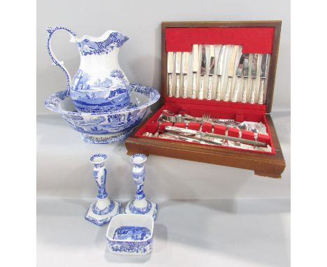 A part set silver plated canteen of cutlery and an  Italian Tower pattern toilet set of jug bowl, pair of candlesticks and a 