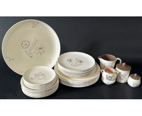 A 1950s Freeform Poole pottery open bowl with repeating leaf detail, further oval meat plate with celadon ground, a quantity 