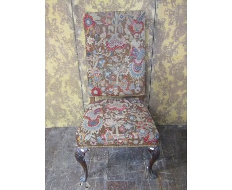 An 18th century side chair the forelegs with shell carved knees, the Grande and petite tapestry seat and back, 120 cm height 