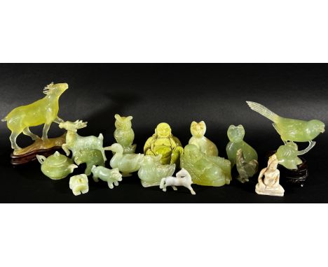 A collection of Chinese carved bowenite jade, pink quartz and other hardstone animals, to include malachite and other elephan