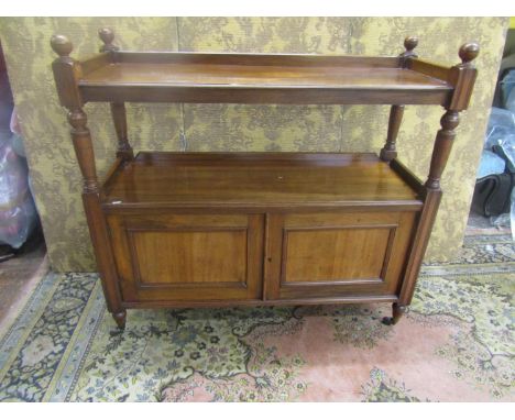 Victorian mahogany buffet, the lower section enclosed by two panelled doors, the upper with shelves on turned supports, 120cm