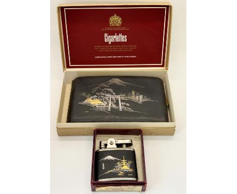 A Japanese cigarette case and matching cigarette lighter each with silver and gilt inlay depicting Mount Fuji and landscape 