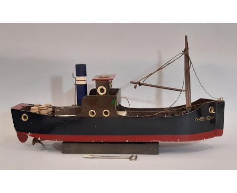 A clockwork wooden-bodied tug-style model Coastal Steamer No.1, ‘BRITISH TRADER’ pond yacht by Triang, circa 1936 length 45cm