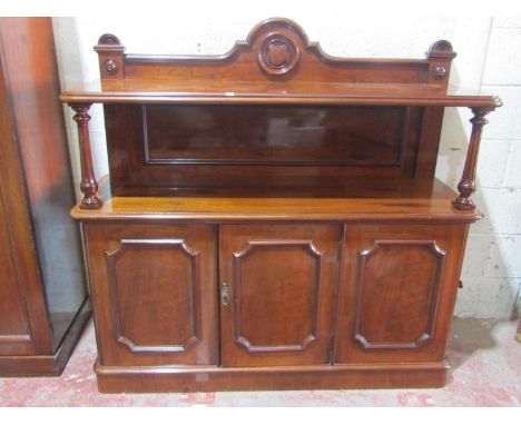 A Victorian mahogany buffet, the lower section enclosed by three panelled doors, turned columns and raised upper gallery, 155