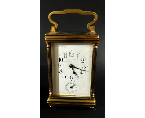 A late 19th century brass carriage clock with eight day striking movement, currently running 