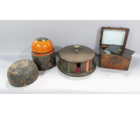 An Indian nest of eight decreasing domed boxes, the largest dark and with damage concealing a further seven brightly painted,