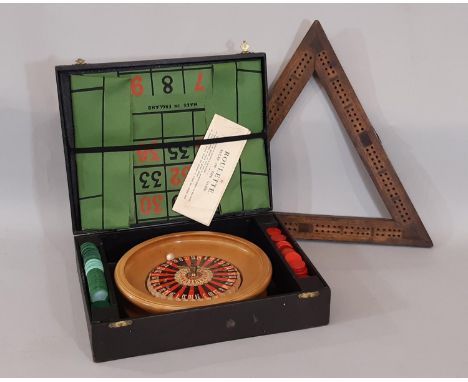 Vintage game of Roulette comprising wooden wheel, counters, cloth and Chad Valley instructions all in a hard case, together w
