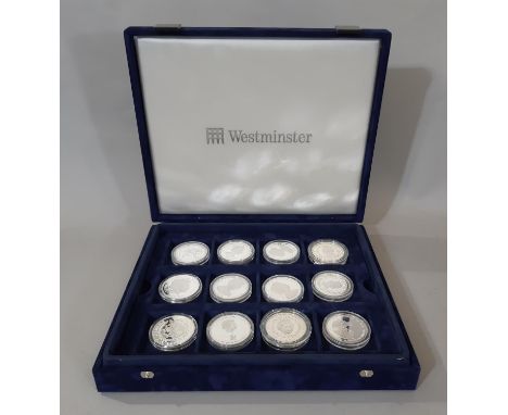 The Queen Elizabeth II 75th Birthday Coin collection, 12 silver proof coins, Warminster Mint set, number 9157 with case and p