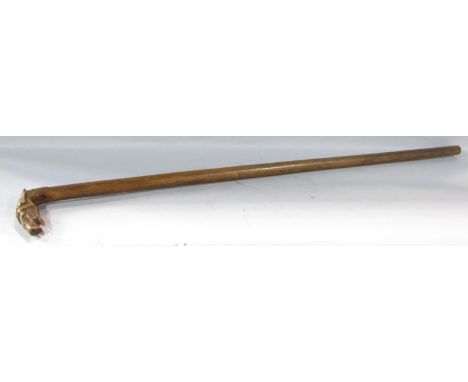 A walking stick with a carved head of a bridled horse handle, with an indistinct stamp, 83cm. 