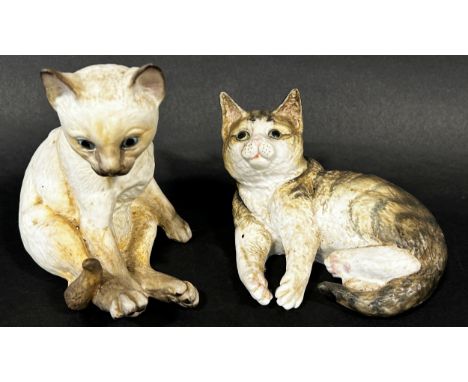 Four Royal Crown Derby figural candlesticks (4) together with two Royal Worcester ceramic kittens, Siamese and Tabby 