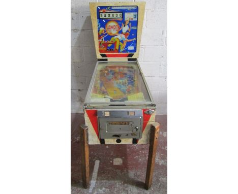 A vintage Champion pinball machine manufactured by Nordamatic, (af) 