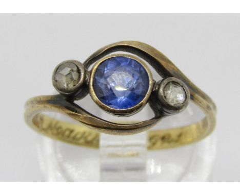 Antique yellow metal sapphire and rose-cut diamond three stone crossover ring, inscribed 'Maggie 1921', size K/L, 2.5g 