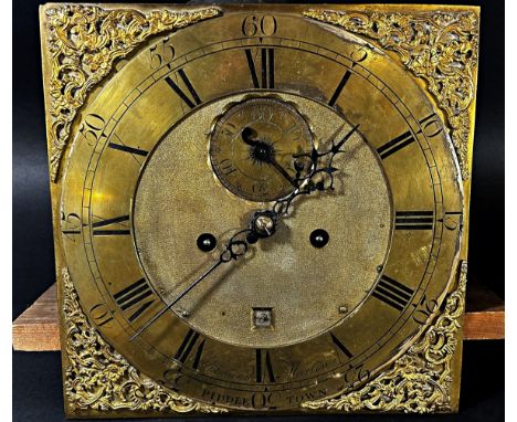 A Georgian longcase clock dial and movement, the square brass dial with engraved chapter ring and applied spandrels with eigh