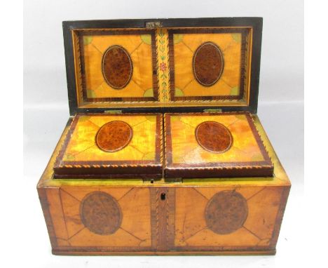 An 18th century satinwood and burr walnut veneered tea caddy, the lid opening to reveal two matching internal covers, 25cm x 