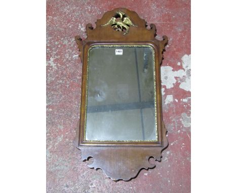 A Chippendale style wall mirror with gilt ho ho bird detail 