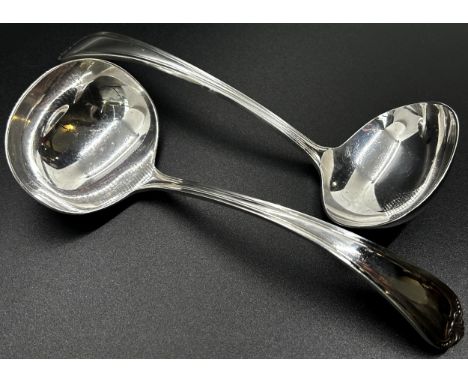 An Edwardian silver vesta case with striking pad 8.5 cm x 4.5 cm maker Henry Wilkinson Ltd, a silver button hook and a pair o