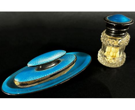 A mixed selection of silver tableware including two 19th century serving spoons, condiment spoons, a fish knife, blue enamell