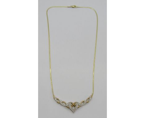 Celtic style 9ct diamond set pendant necklace, maker 'GA', Sheffield, 4.7g 