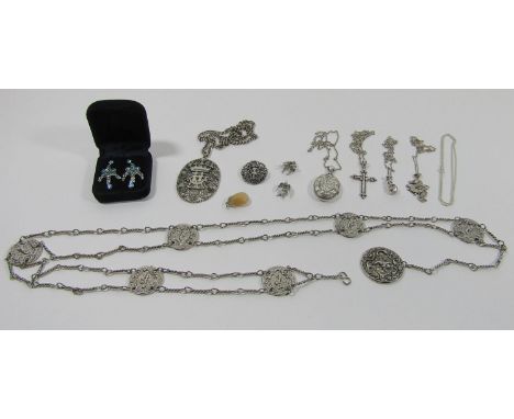 Five silver chain necklaces, four with associated silver pendants to include an Aesthetic Movement locket with engraved flora