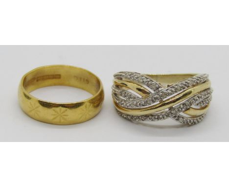 22ct wedding ring with engraved star detail, size M, 4.2g and a 9ct bi-colour diamond crossover ring, size O/P, 3.6g (2) 