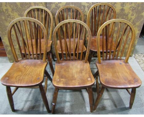 A set of six Windsor hoop and stick back, elm and beechwood dining chairs 