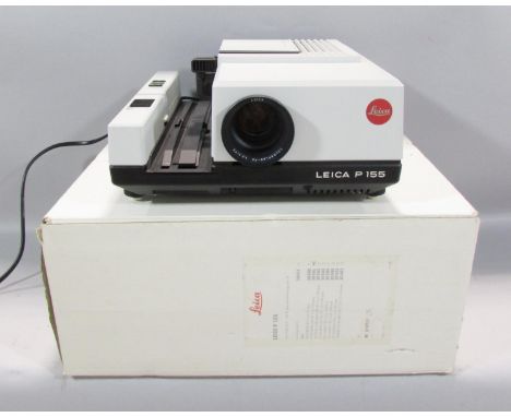 A Leica P 155 slide projector, with instruction manual and original box. 