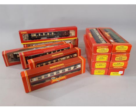 14 coaches by Hornby including 3 southern rail coaches in Malachite livery R445, 486 and 487, a BR Centenary Brake Coach in c