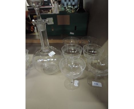 A set of six Antoinette champagne style glasses and decanter