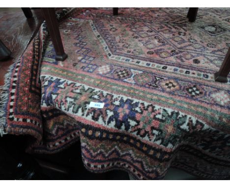 A 20th century carpet square of Persian design having blue and red ground, 79' x 63'