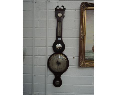 A 19th century mahogany wheel barometer labelled Hunter Brixton, having thermometer and humidity scale