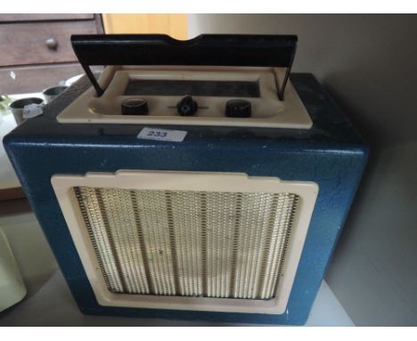 A vintage Ever Ready portable radio  receiver, battery B103, in blue and cream case (collectors item only)