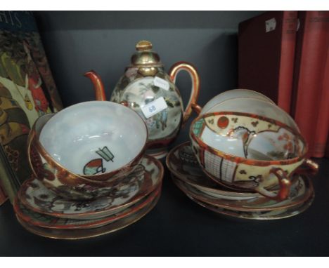 A 20th century Japanese eggshell tea service of traditional design 