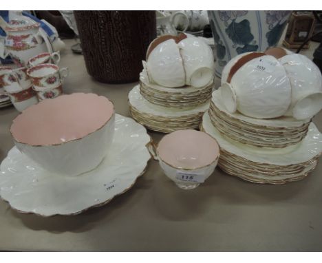 A vintage pink, white and gilt part tea service