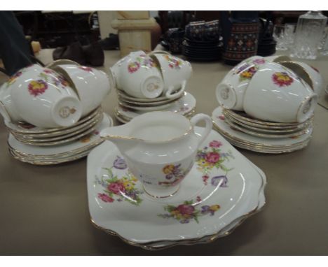 A Hamilton bone china part tea service with floral design