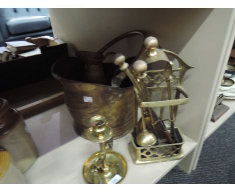 A brass coal helmet and companion stand, night stand and copper jug